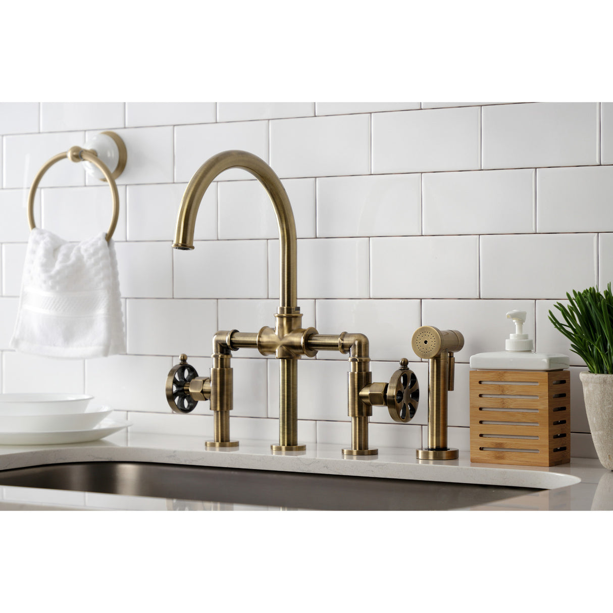 Kingston Brass KS2333RX Belknap Industrial Style Bridge Kitchen Faucet with Brass Sprayer, Antique Brass