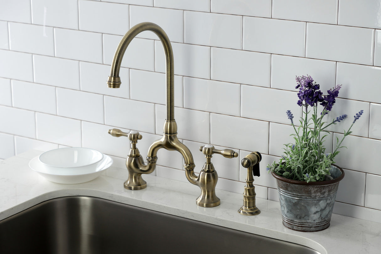 Kingston Brass KS7793TALBS Tudor Bridge Kitchen Faucet with Brass Sprayer, Antique Brass