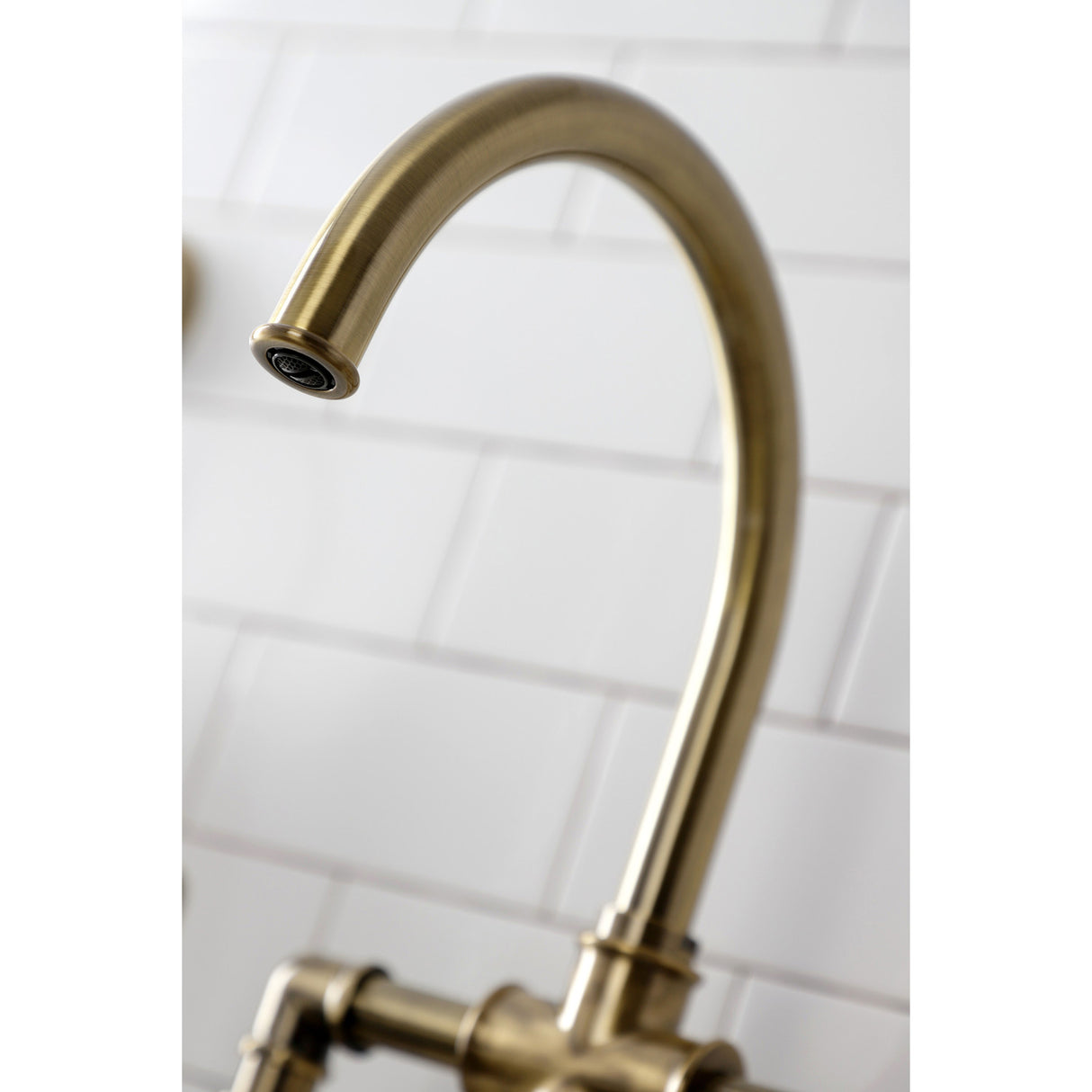 Kingston Brass KS2333KL Whitaker Industrial Style Bridge Kitchen Faucet with Brass Sprayer, Antique Brass