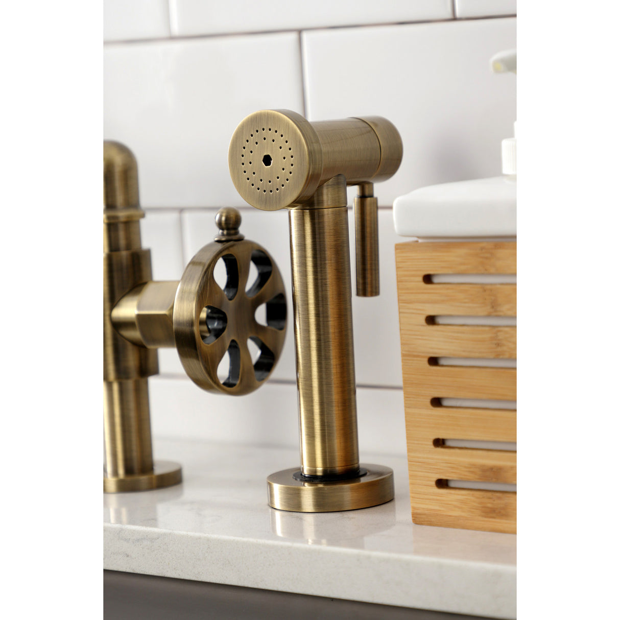 Kingston Brass KS2333RX Belknap Industrial Style Bridge Kitchen Faucet with Brass Sprayer, Antique Brass
