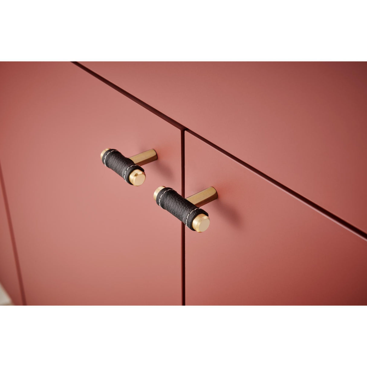 Atlas Homewares Zanzibar Black Leather Knob 1 7/8 Inch Warm Brass