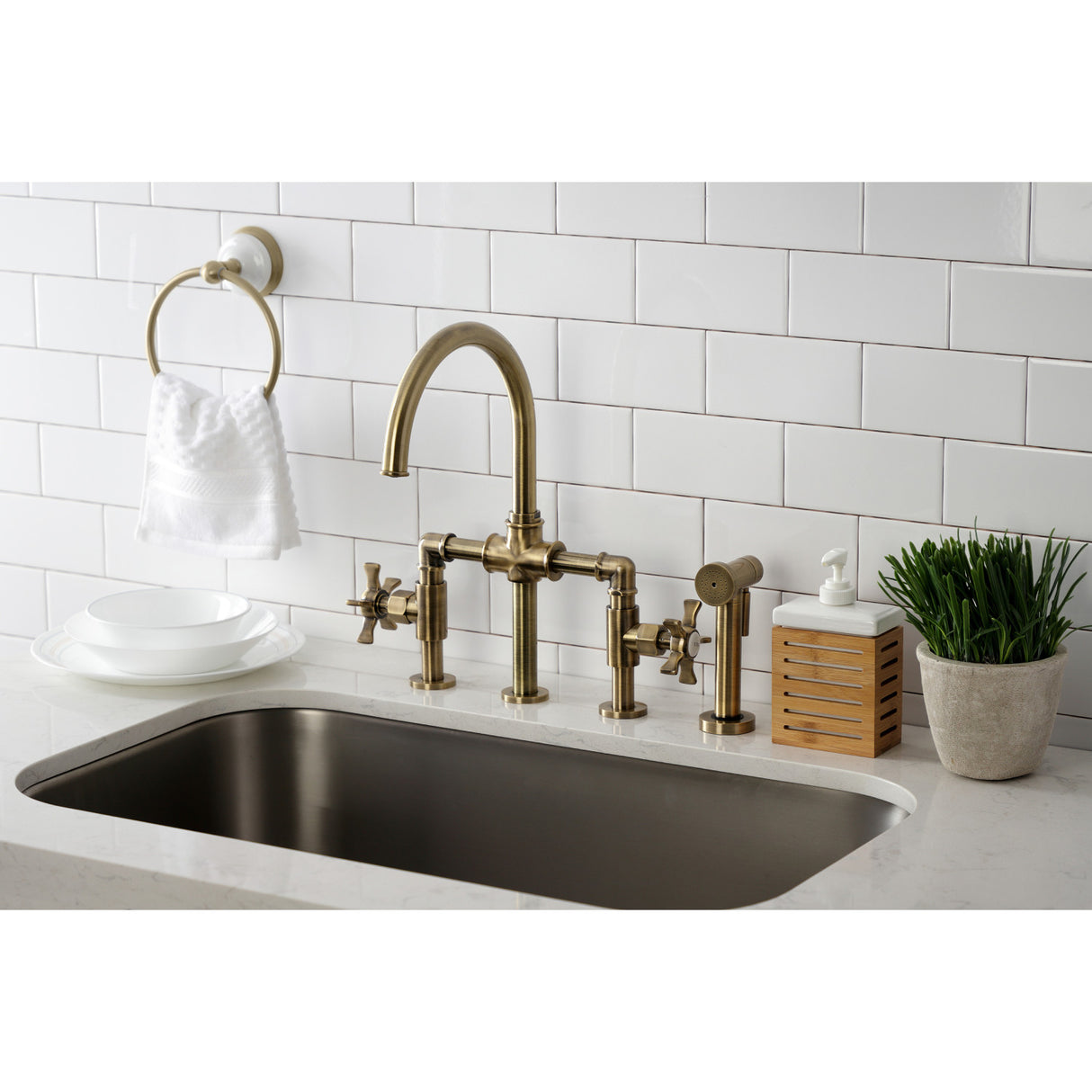 Kingston Brass KS2333NX Hamilton Industrial Style Bridge Kitchen Faucet with Brass Sprayer, Antique Brass