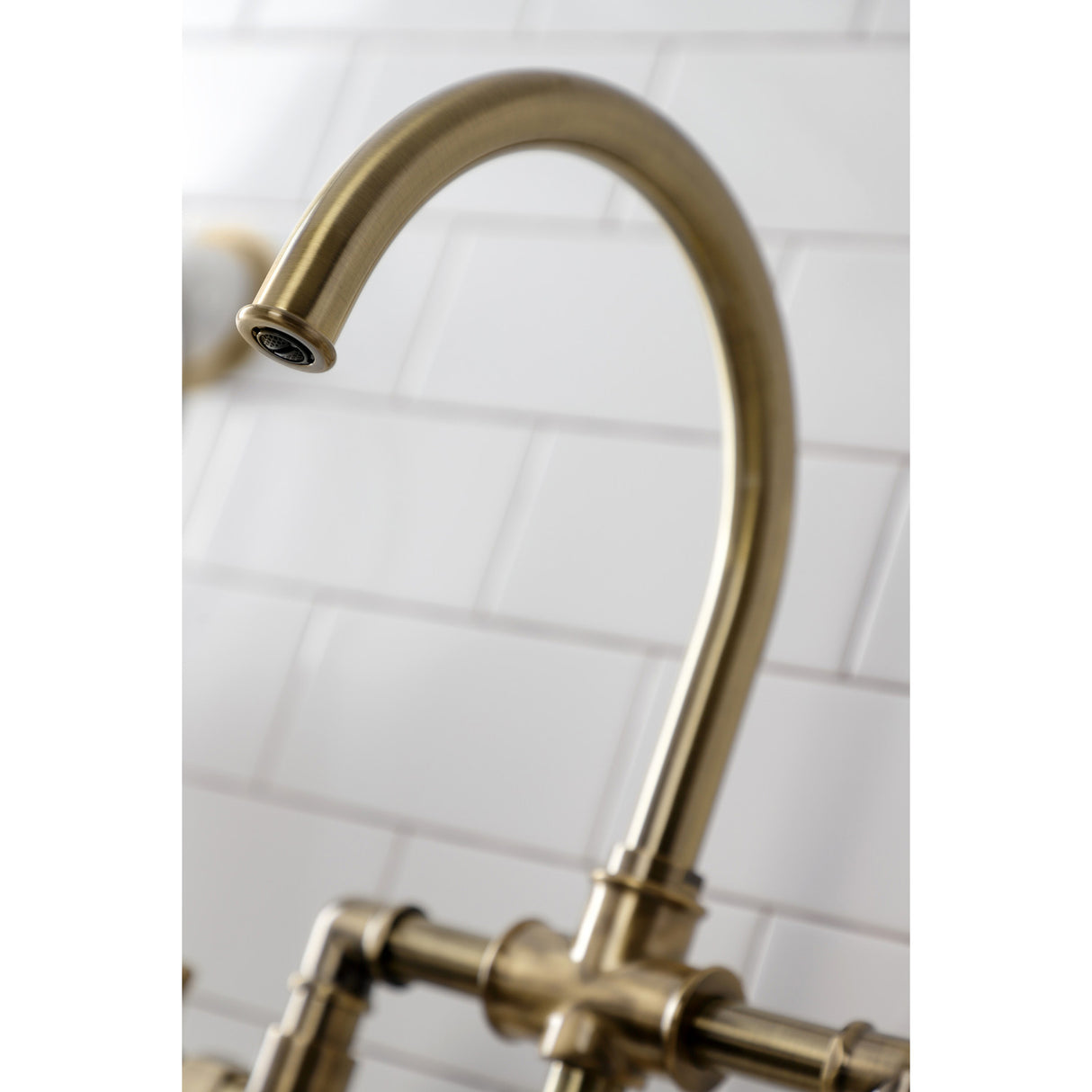 Kingston Brass KS2333NX Hamilton Industrial Style Bridge Kitchen Faucet with Brass Sprayer, Antique Brass