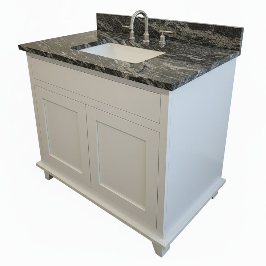 White kitchen cabinet with marble countertop and appliances in the background