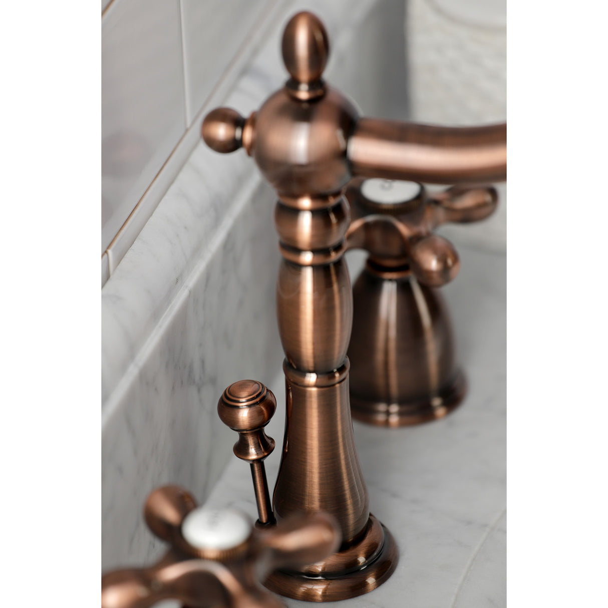 Kingston Brass KB197AXAC Heritage Widespread Bathroom Faucet with Brass Pop-Up, Antique Copper