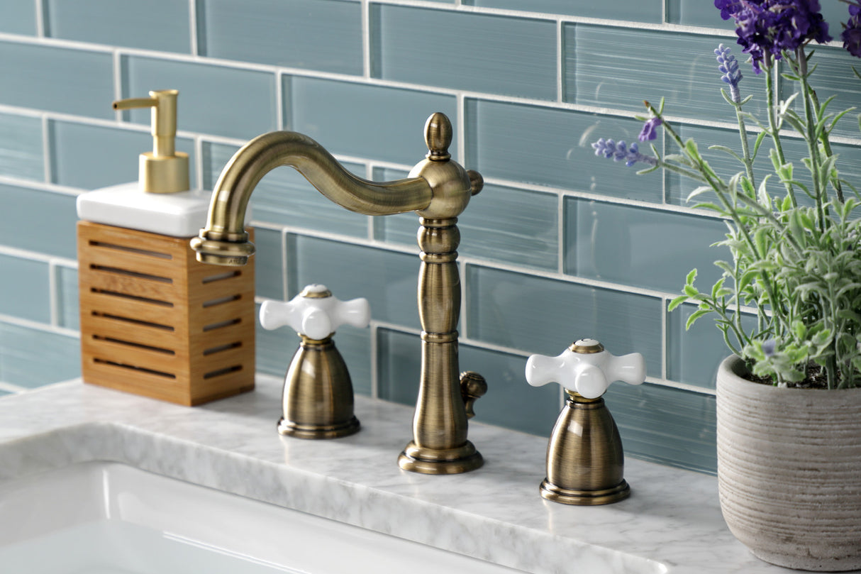 Kingston Brass KB1973PX Heritage Widespread Bathroom Faucet with Brass Pop-Up, Antique Brass