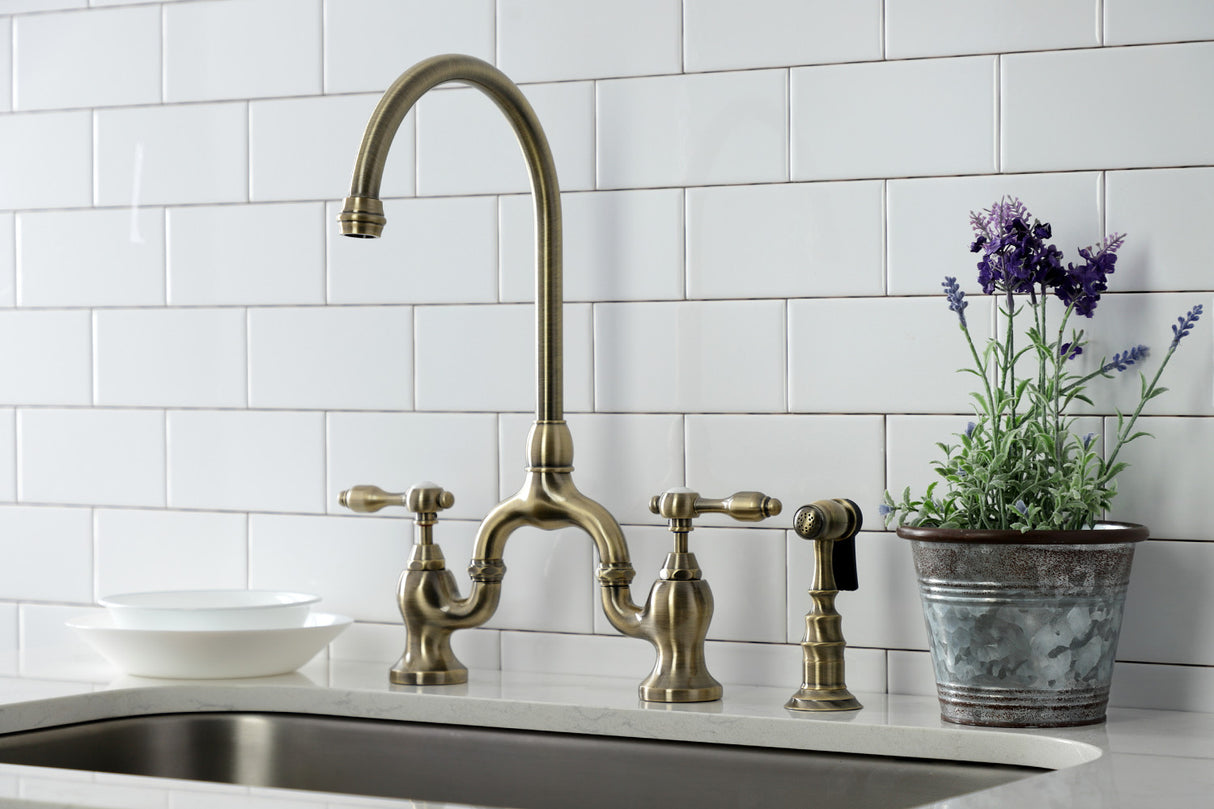Kingston Brass KS7793TALBS Tudor Bridge Kitchen Faucet with Brass Sprayer, Antique Brass