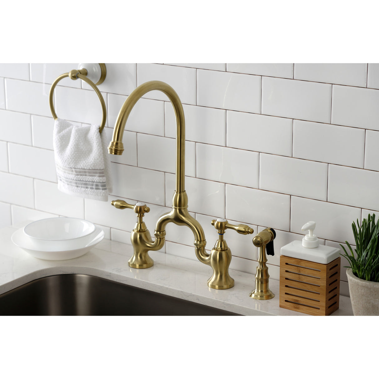 Kingston Brass KS7797TALBS Tudor Bridge Kitchen Faucet with Brass Sprayer, Brushed Brass