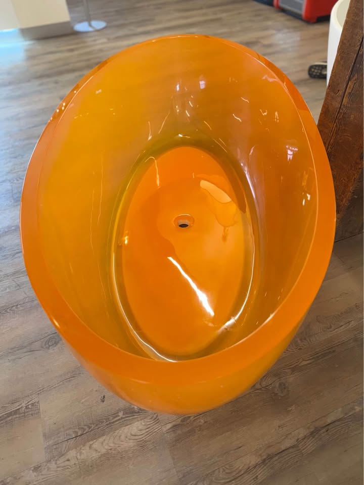 Opal 67 in. One Piece Stone Resin Freestanding Bathtub in Translucent Orange