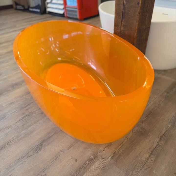Opal 67 in. One Piece Stone Resin Freestanding Bathtub in Translucent Orange
