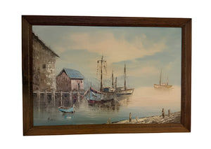 Framed painting of a harbor scene with boats and buildings.