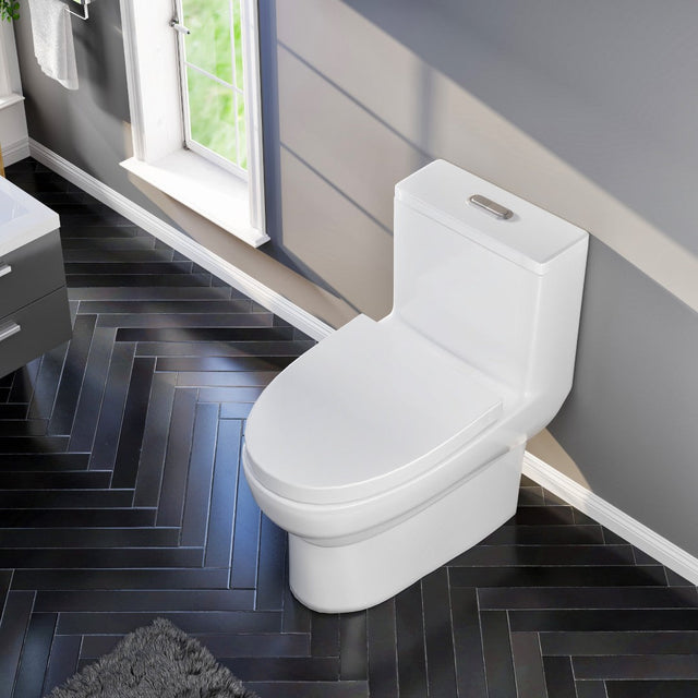 Scale 12 inch Floor Mounted 1-piece 1.28 GPF Dual Flush Elongated Toilet in White Seat Included