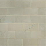 Sande cream 12x12 polished porcelain mesh mounted mosaic tile NSANCRE2X4P product shot multiple tiles angle view