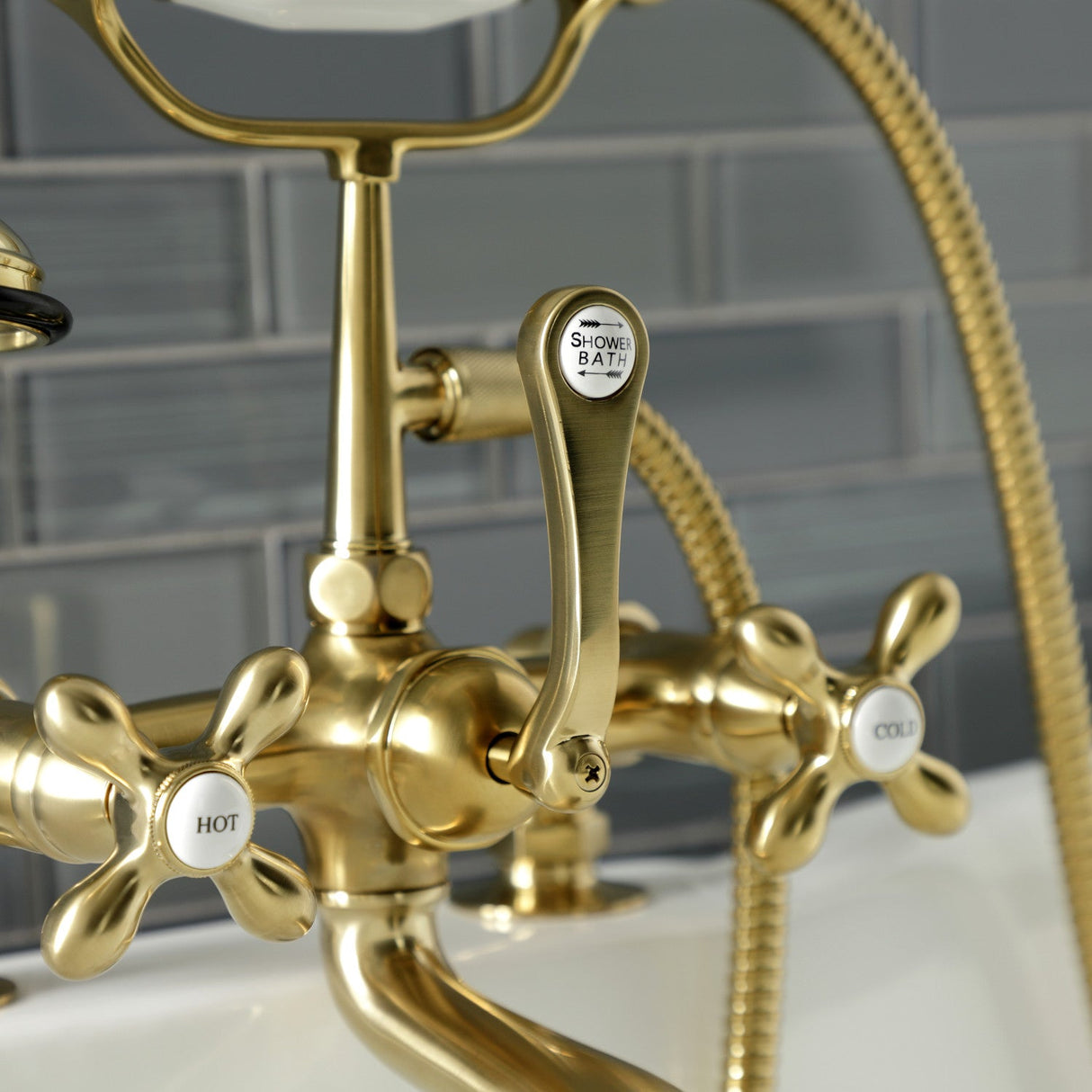 Aqua Vintage AE209T7 Three-Handle 2-Hole Deck Mount Clawfoot Tub Faucet with Hand Shower, Brushed Brass