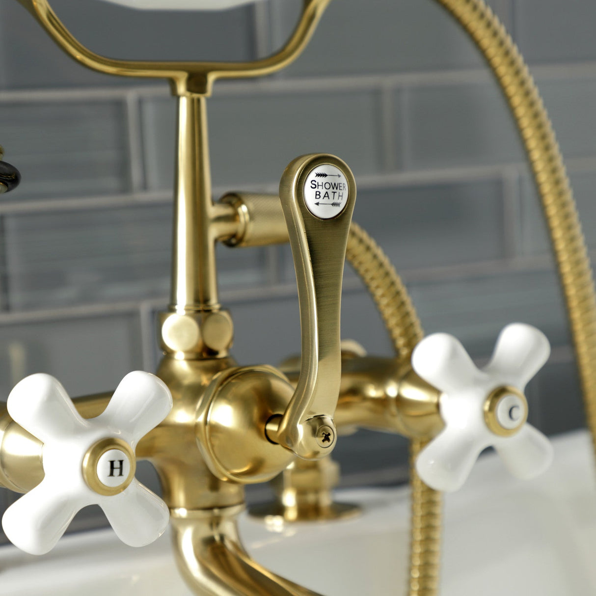 Aqua Vintage AE211T7 Three-Handle 2-Hole Deck Mount Clawfoot Tub Faucet with Hand Shower, Brushed Brass