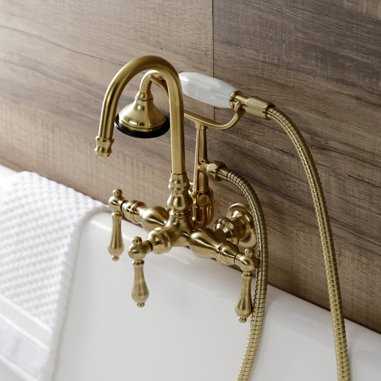 Aqua Vintage AE7T7 Three-Handle 2-Hole Tub Wall Mount Clawfoot Tub Faucet with Hand Shower, Brushed Brass