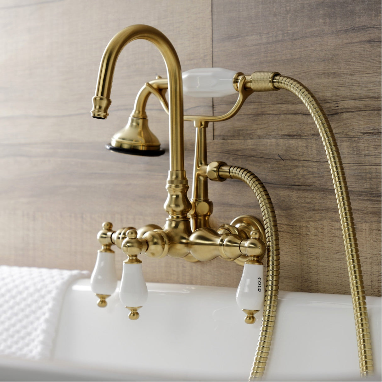 Aqua Vintage AE9T7 Three-Handle 2-Hole Tub Wall Mount Clawfoot Tub Faucet with Hand Shower, Brushed Brass