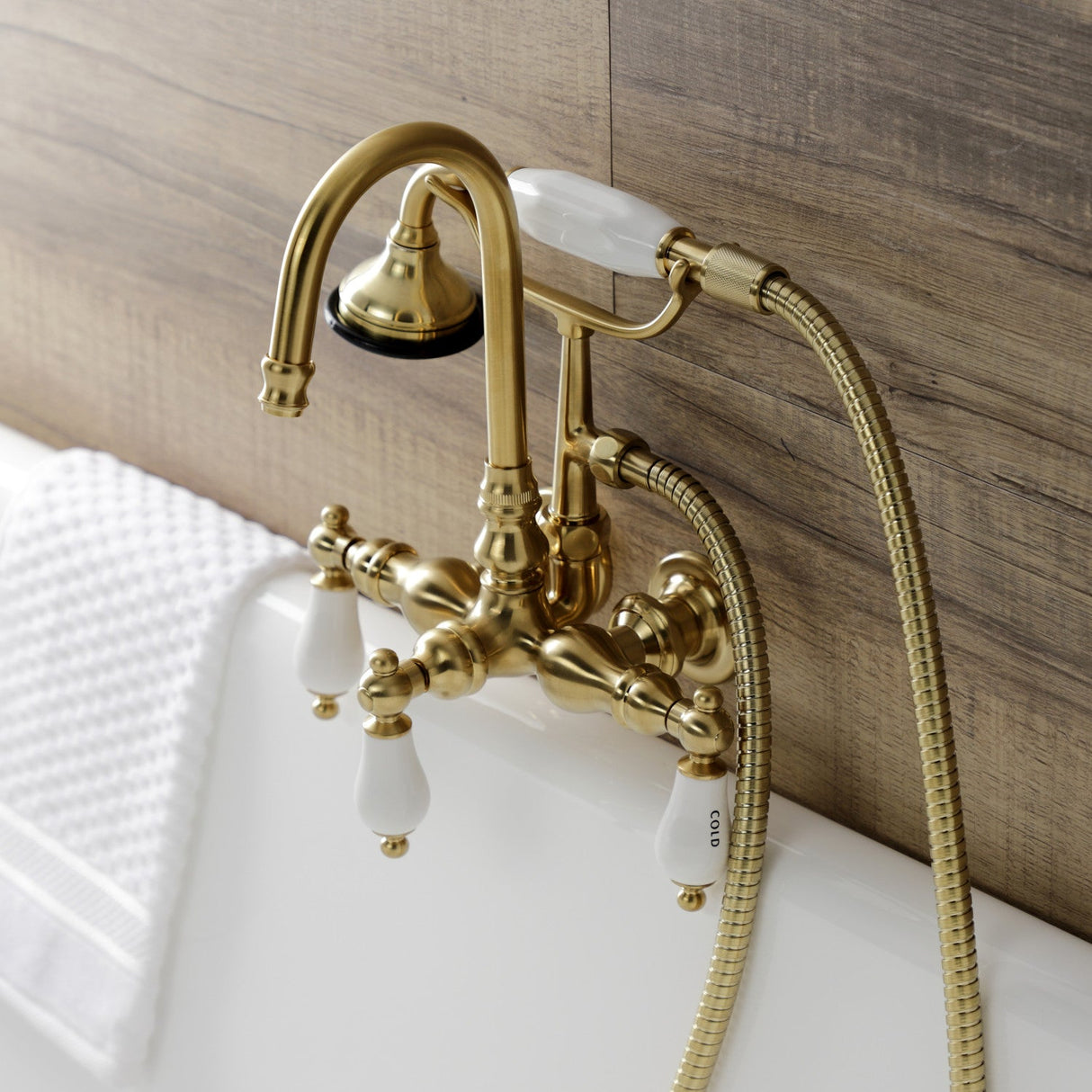 Aqua Vintage AE9T7 Three-Handle 2-Hole Tub Wall Mount Clawfoot Tub Faucet with Hand Shower, Brushed Brass