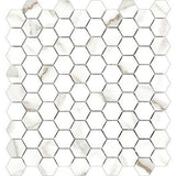 Anatolia Tile 1.25 Inch Mayfair Calacatta Polished Porcelain Hexagon Mosaics. 1 Sheet = .97 Sq. Ft. 4501-0146-1 Calacatta Oro 1.25" Hexagon - premium natural stone mosaic tile from Anatolia Tile, available at PoshHaus showroom in Keene, NH