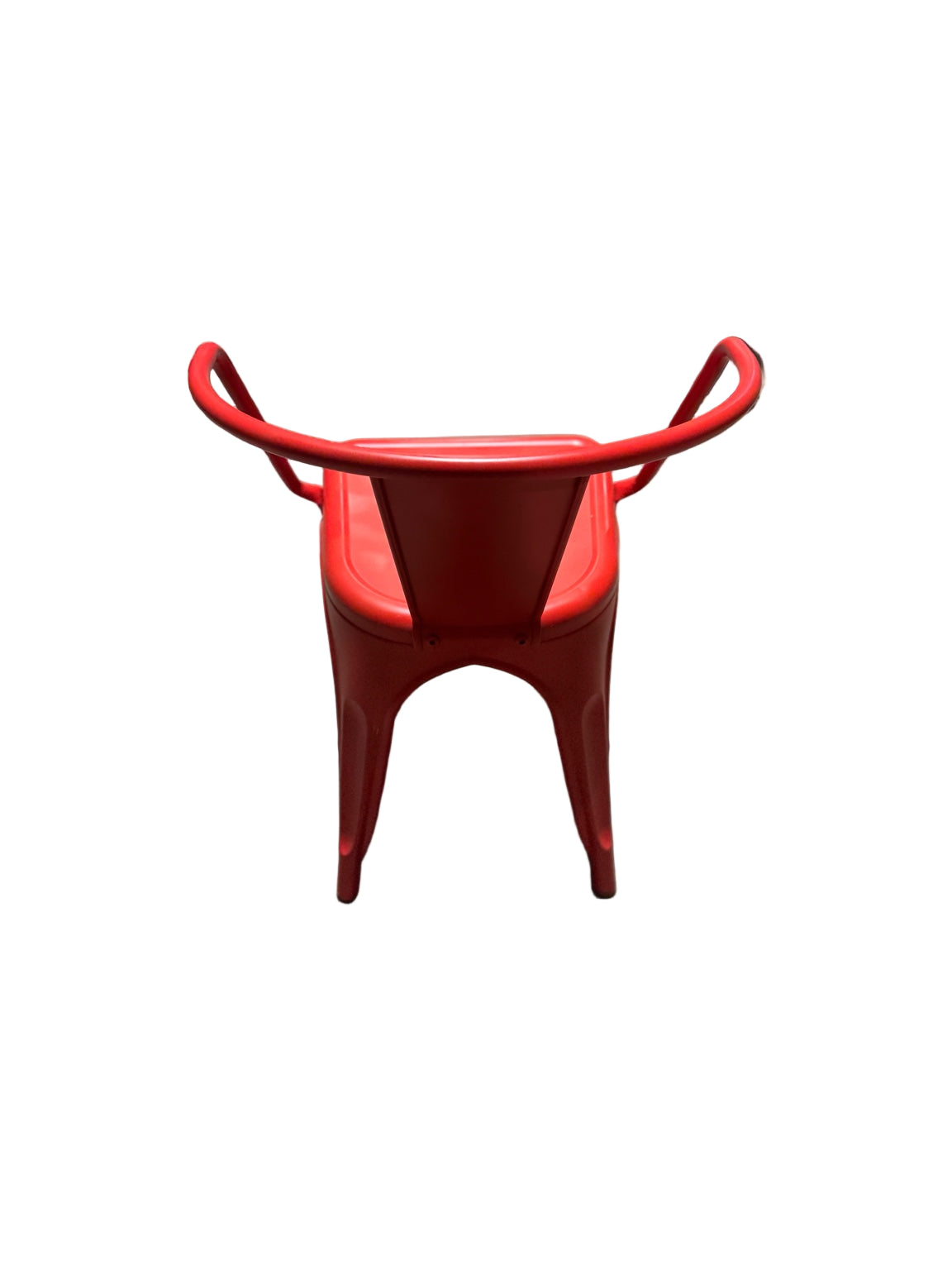 Red metal chair on a concrete floor with people and clothes in the background