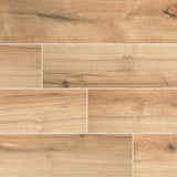 MSI Wood Collection palmetto cognac 6x36 porcelain floor wall tile product shot multiple planks NPALCOG6X36 angle view