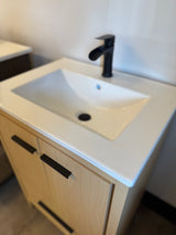 24"  Natural Oak Vanity Set with Ceramic Top and Integrated Sink, and Black Faucet