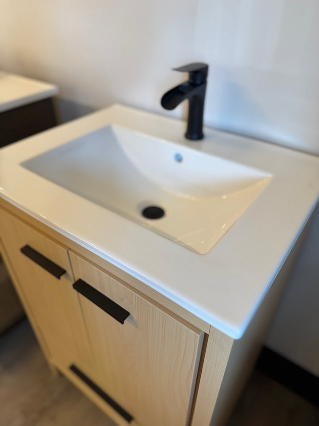 24"  Natural Oak Vanity Set with Ceramic Top and Integrated Sink, and Black Faucet