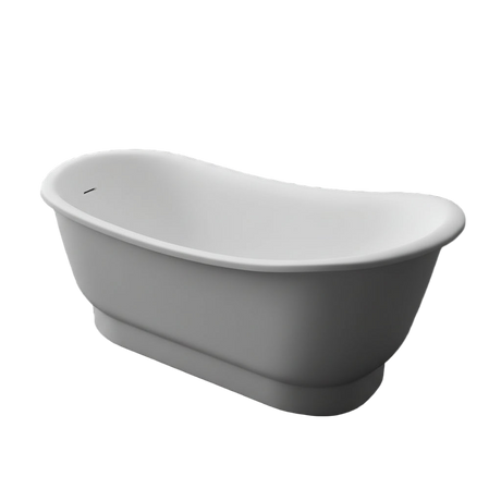 White freestanding bathtub in a modern bathroom setting with a gray rug and slippers.