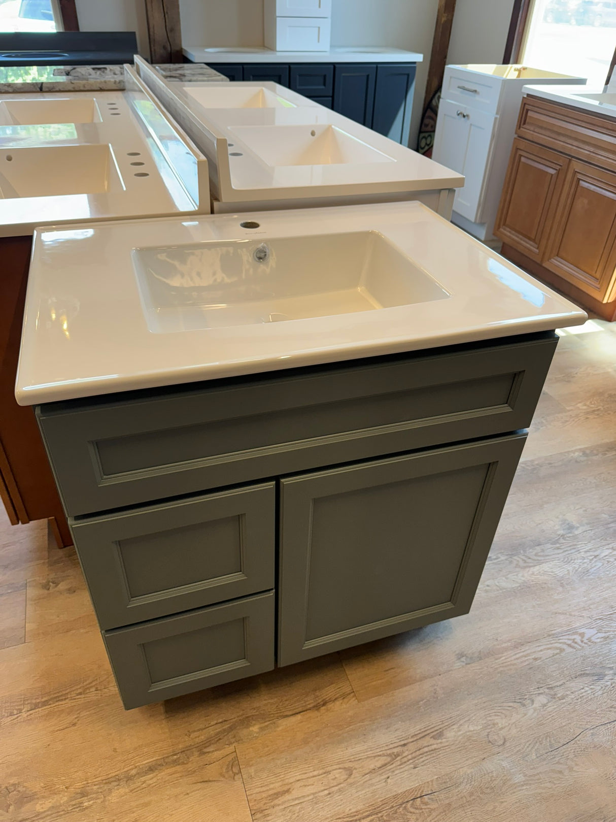 31" Sage Green J&K Cabinetry Vanity with Swiss Madison Ceramic Vanity Top & Dual Drawer Storage