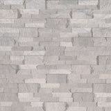 Iceland gray splitface ledger panel 6X24 natural travertine wall tile LPNLTICEGRY624 product shot multiple tiles angle view