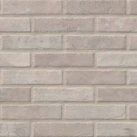 MSI brick collection capella ivory brick NCAPIVOBRI2X10 glazed porcelain floor wall tile product shot multiple brick angle view#Size_2-1/3"x10"