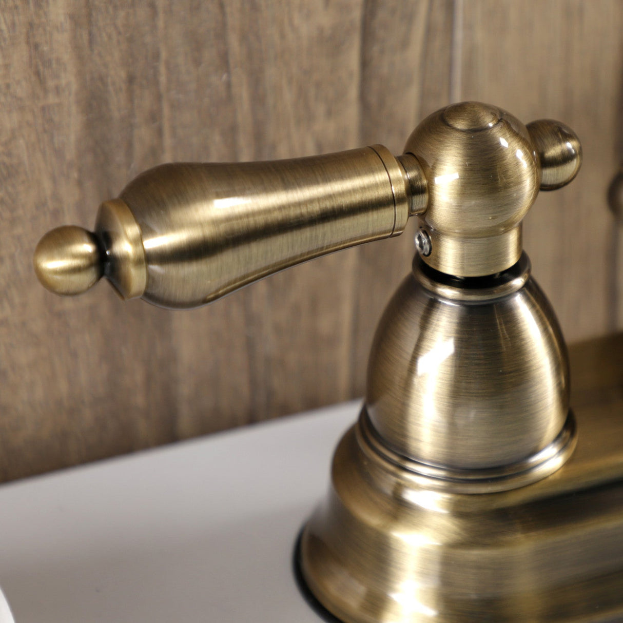 Heritage KB1603AL Two-Handle 3-Hole Deck Mount 4" Centerset Bathroom Faucet with Plastic Pop-Up, Antique Brass