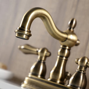 Heritage KB1603AL Two-Handle 3-Hole Deck Mount 4" Centerset Bathroom Faucet with Plastic Pop-Up, Antique Brass