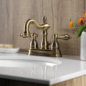 Heritage KB1603AL Two-Handle 3-Hole Deck Mount 4" Centerset Bathroom Faucet with Plastic Pop-Up, Antique Brass