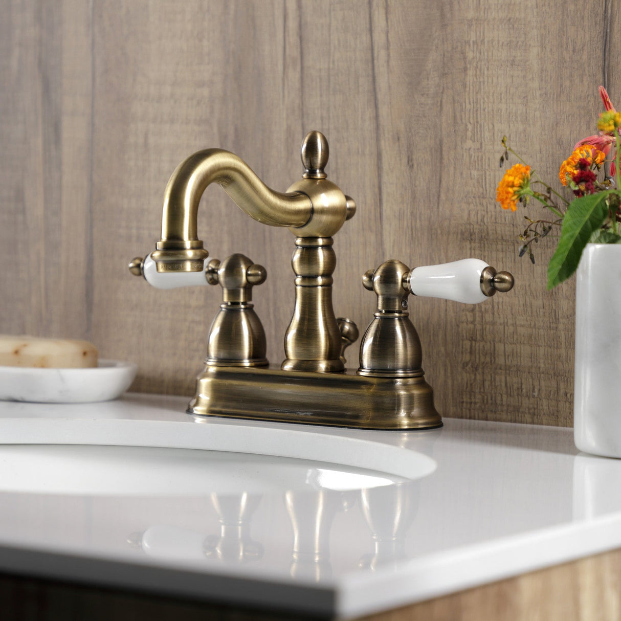 Heritage KB1603PL Two-Handle 3-Hole Deck Mount 4" Centerset Bathroom Faucet with Plastic Pop-Up, Antique Brass