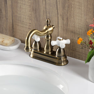 Heritage KB1603PX Two-Handle 3-Hole Deck Mount 4" Centerset Bathroom Faucet with Plastic Pop-Up, Antique Brass