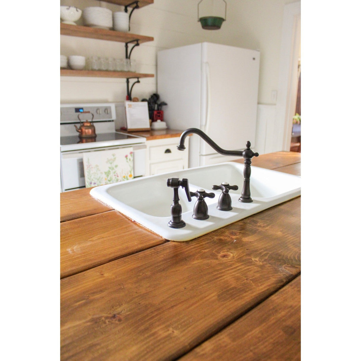 Heritage KB1795AXBS Two-Handle 4-Hole Deck Mount Widespread Kitchen Faucet with Brass Sprayer, Oil Rubbed Bronze