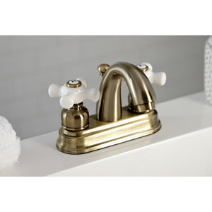Restoration KB5613PX Two-Handle 3-Hole Deck Mount 4" Centerset Bathroom Faucet with Plastic Pop-Up, Antique Brass
