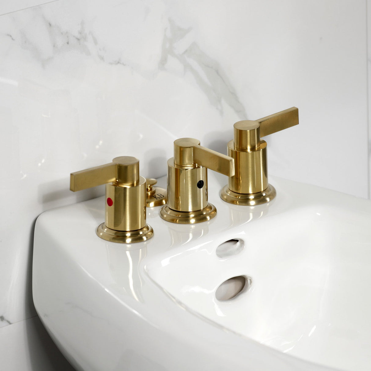 NuvoFusion KB6327NDL Three-Handle Vertical Spray Bidet Faucet with Brass Pop-Up, Brushed Brass