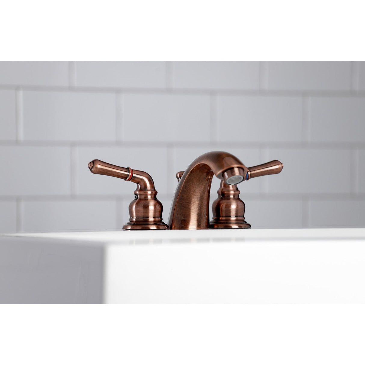 Magellan KB956 Two-Handle 3-Hole Deck Mount Mini-Widespread Bathroom Faucet with Plastic Pop-Up, Antique Copper