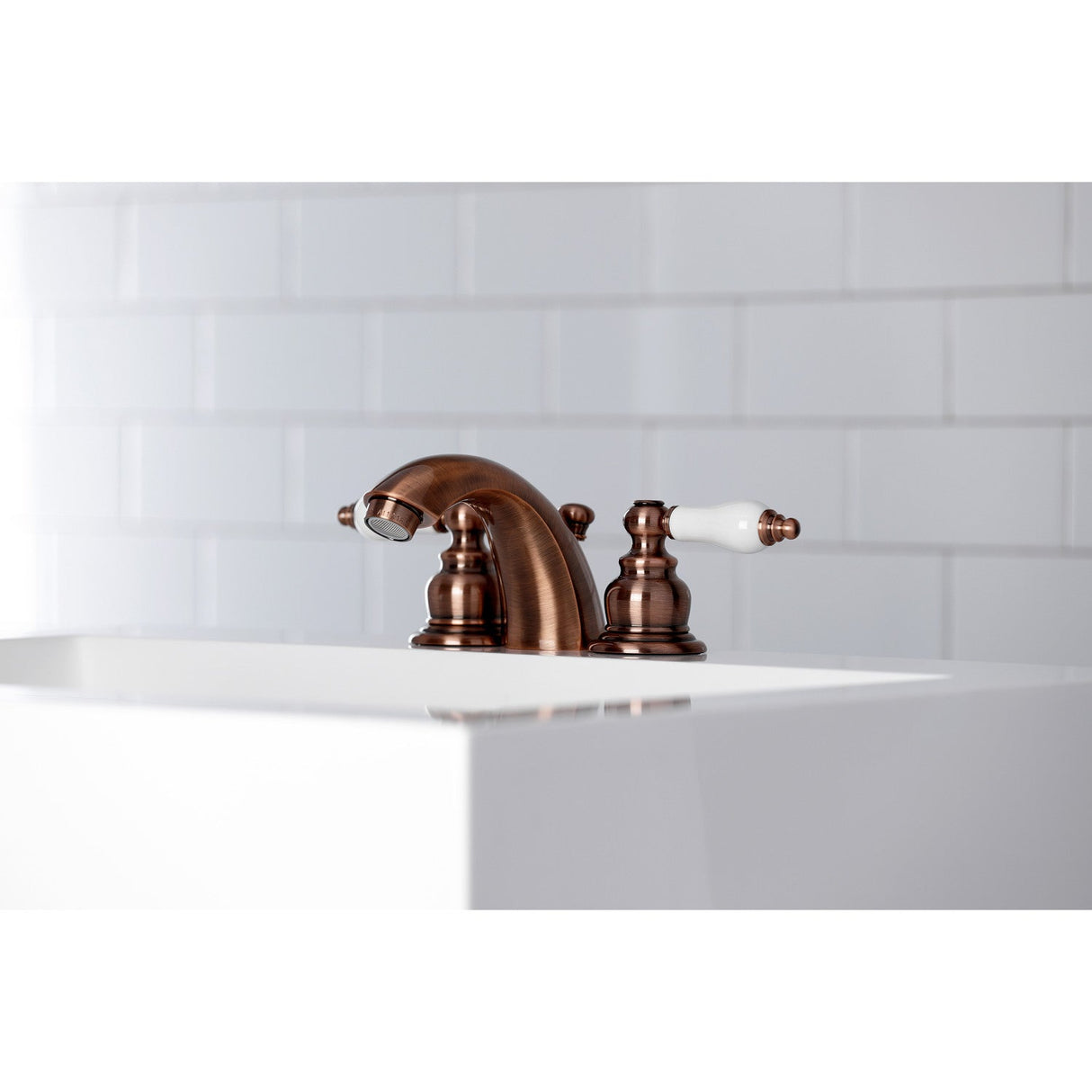 Victorian KB956PL Two-Handle 3-Hole Deck Mount Mini-Widespread Bathroom Faucet with Plastic Pop-Up, Antique Copper