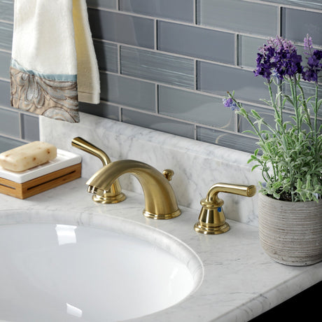 Restoration KB967RXLSB Two-Handle 3-Hole Deck Mount Widespread Bathroom Faucet with Plastic Pop-Up, Brushed Brass