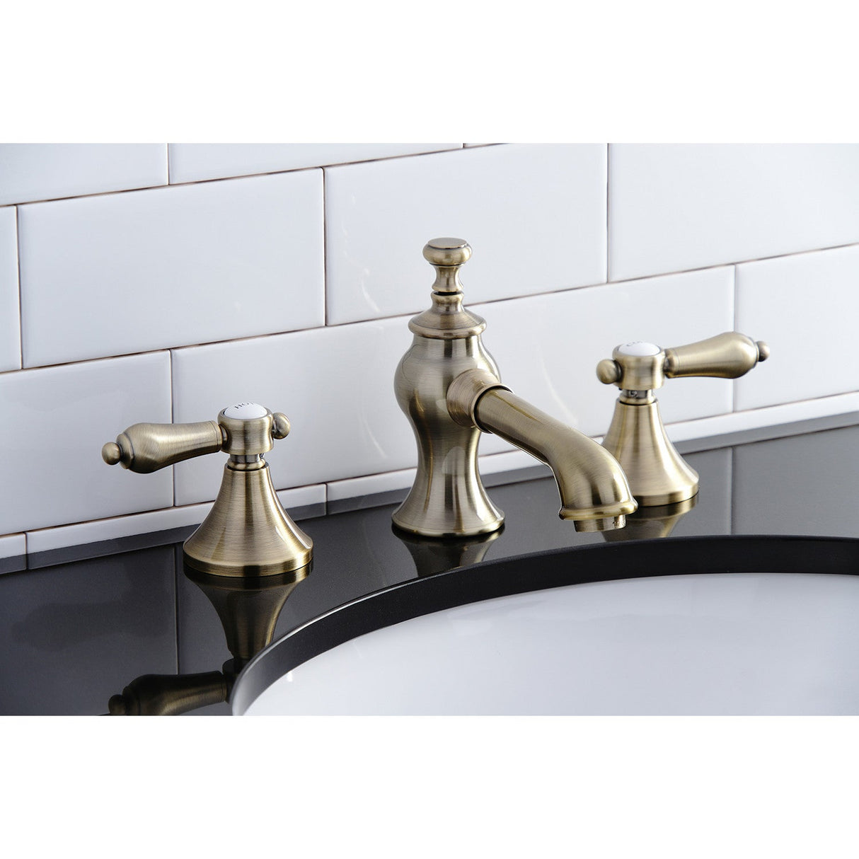 Heirloom KC7063BAL Two-Handle 3-Hole Deck Mount Widespread Bathroom Faucet with Brass Pop-Up, Antique Brass