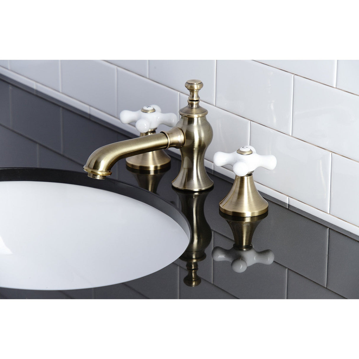 Vintage KC7063PX Two-Handle 3-Hole Deck Mount Widespread Bathroom Faucet with Brass Pop-Up, Antique Brass