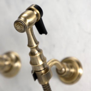 Heritage KS1243AXBS Two-Handle 2-Hole Wall Mount Bridge Kitchen Faucet with Brass Sprayer, Antique Brass