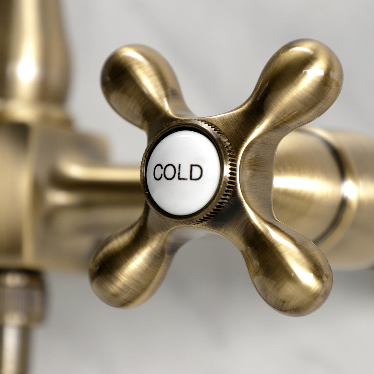 Heritage KS1243AXBS Two-Handle 2-Hole Wall Mount Bridge Kitchen Faucet with Brass Sprayer, Antique Brass