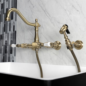Heritage KS1243PLBS Two-Handle 2-Hole Wall Mount Bridge Kitchen Faucet with Brass Sprayer, Antique Brass