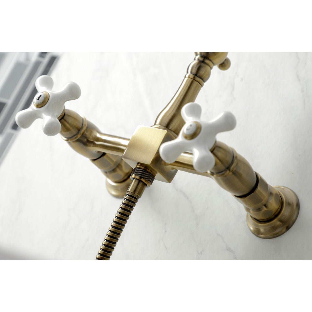 Heritage KS1243PXBS Two-Handle 2-Hole Wall Mount Bridge Kitchen Faucet with Brass Sprayer, Antique Brass