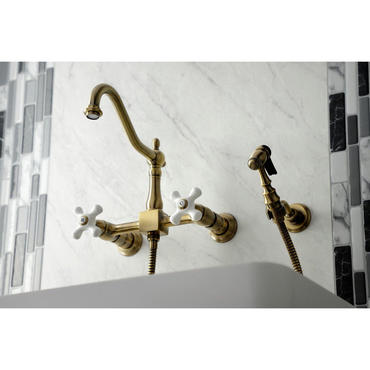 Heritage KS1243PXBS Two-Handle 2-Hole Wall Mount Bridge Kitchen Faucet with Brass Sprayer, Antique Brass