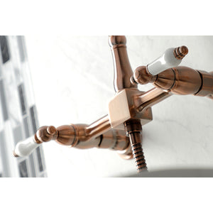 Heritage KS124PLBSAC Two-Handle 2-Hole Wall Mount Bridge Kitchen Faucet with Brass Sprayer, Antique Copper